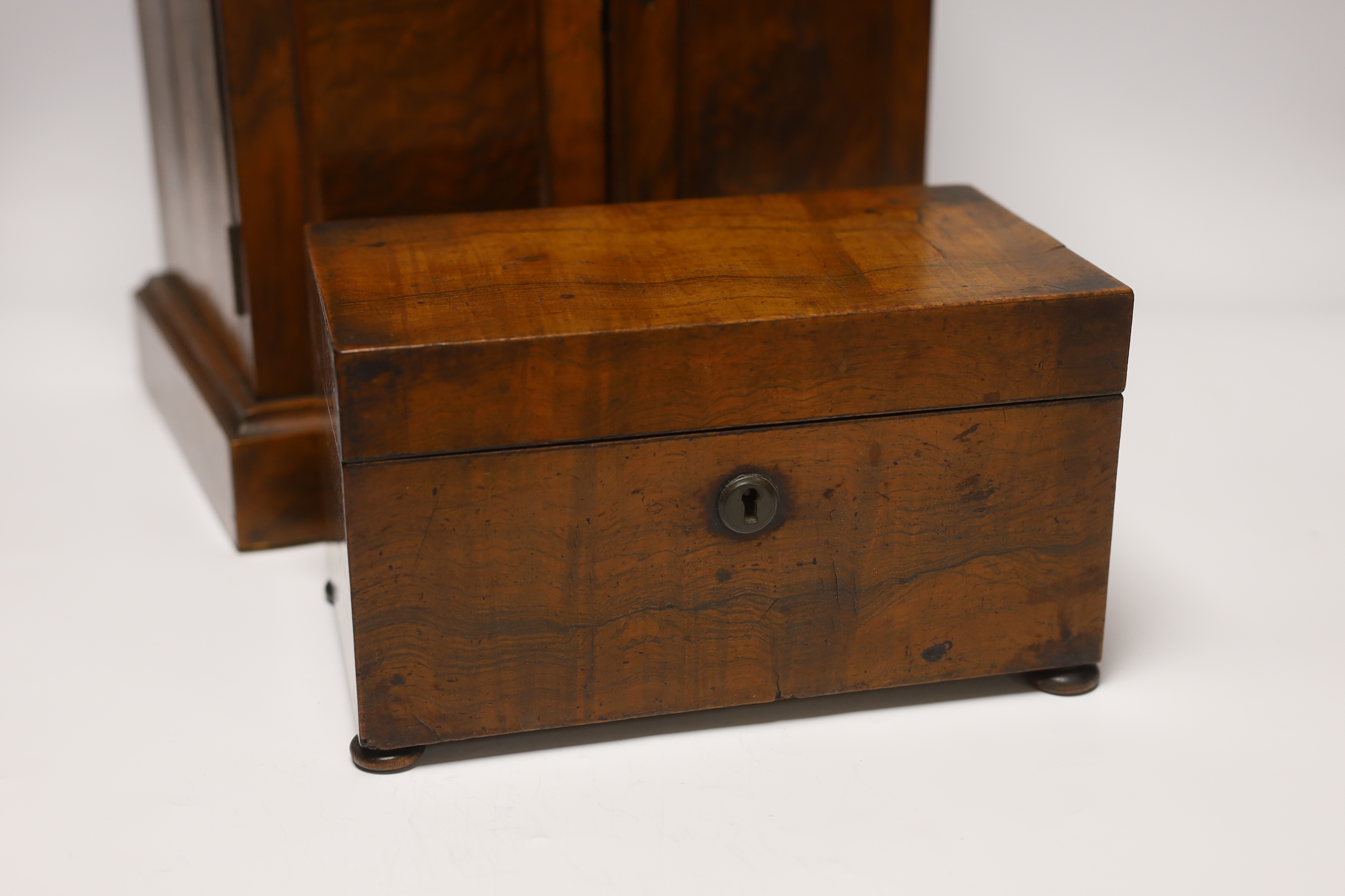A small Victorian three drawer walnut cabinet, together with a mahogany tea caddy, cabinet 35.5cm x 30cm wide